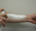 Arm with spray-on foam
